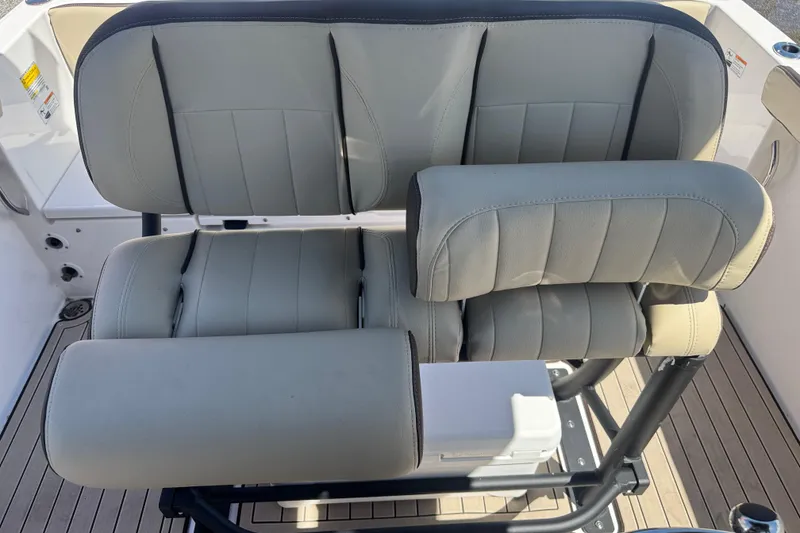 Slide: The Image of Yamaha Boats 2026 255 FSH Sport E seating, featuring plush, gray upholstery and ergonomic design. - 27