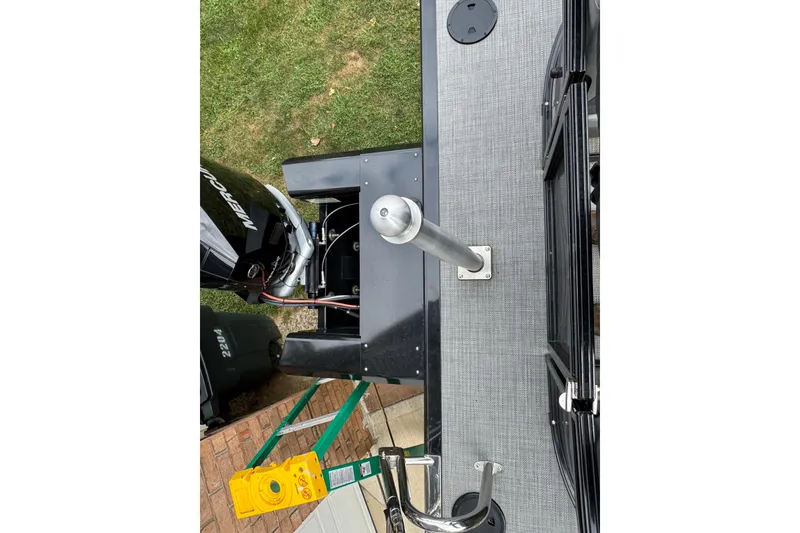 Slide: The Image of Top view of 2024 Regency 230 DL3 boat with Mercury engine. - 27