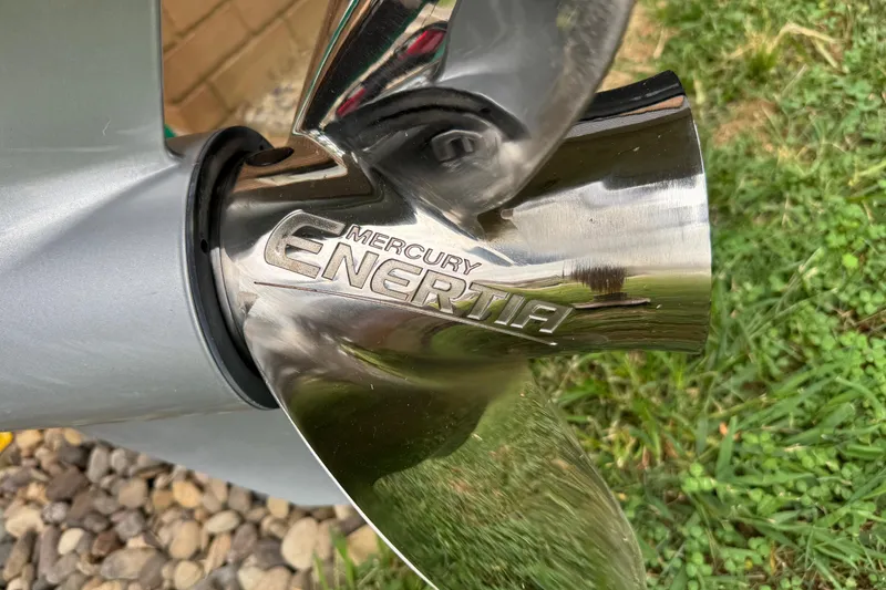 Slide: The Image of Close-up of Mercury Enertia propeller on 2024 Regency 230 DL3 boat. - 9