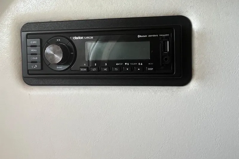 Slide: The Image of Clarion M508 stereo system in 2001 Powerquest 280 Silencer boat interior. - 15