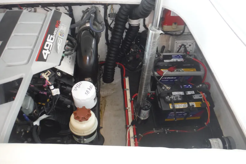 Slide: The Image of Engine compartment of a 2001 Powerquest 280 Silencer with 496 MAG engine and batteries. - 9