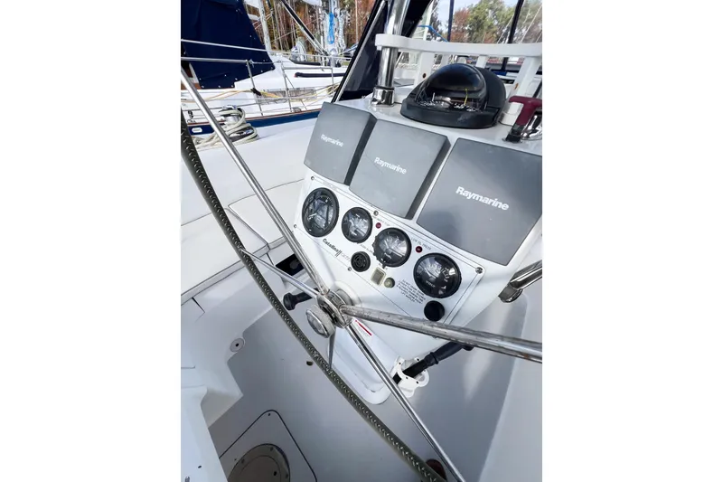 Slide: The Image of Cockpit of 2005 Catalina 350 sailboat with Raymarine navigation instruments. - 12