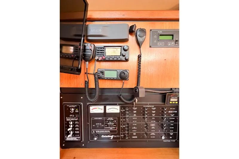 Slide: The Image of Control panel of a 2005 Catalina 350 yacht with communication equipment. - 51