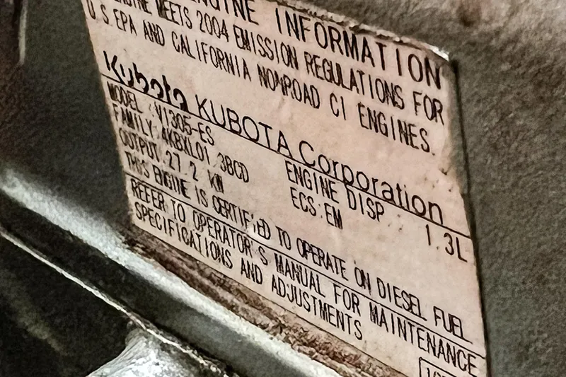 Slide: The Image of Engine information label on a 2005 Catalina 350, featuring Kubota Corporation details. - 60