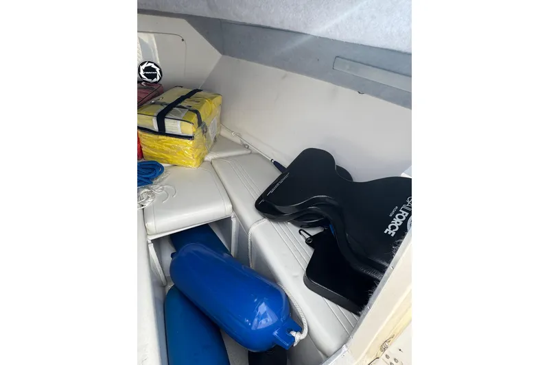 Slide: The Image of Interior of 2001 Fountain 31 Tournament Edition boat with safety gear and equipment. - 29
