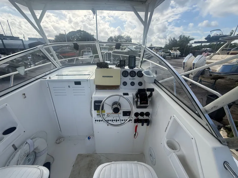 Slide: The Image of Helm of a 2007 Sea Boss 255 WA boat with instruments. - 6