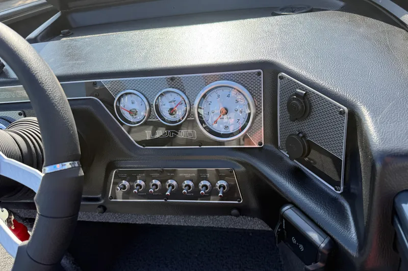 Slide: The Image of Dashboard of 2026 Lund 1875 Crossover XS boat with gauges and controls. - 18
