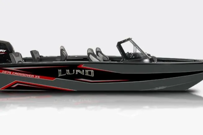 Slide: The Image of 2026 Lund 1875 Crossover XS boat, sleek design with black and red accents. - 35