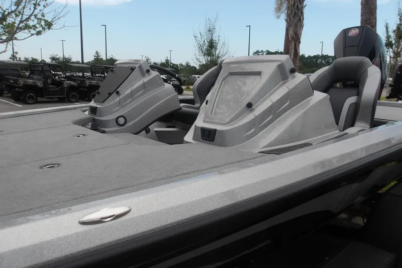 Slide: The Image of 2026 Nitro Z19 XL boat with sleek design and modern seating in a parking lot. - 3