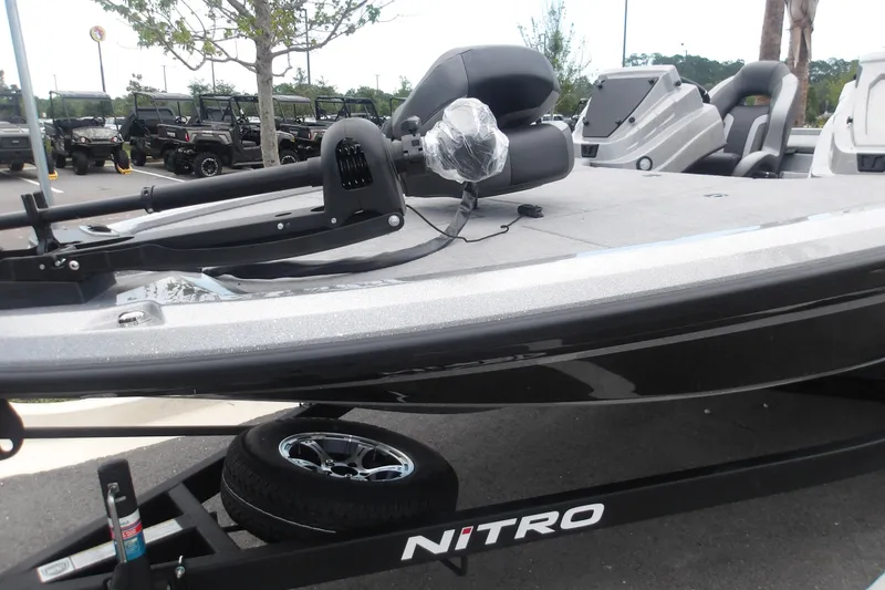 Slide: The Image of 2026 Nitro Z19 XL boat on trailer, featuring sleek design and modern seating. - 2
