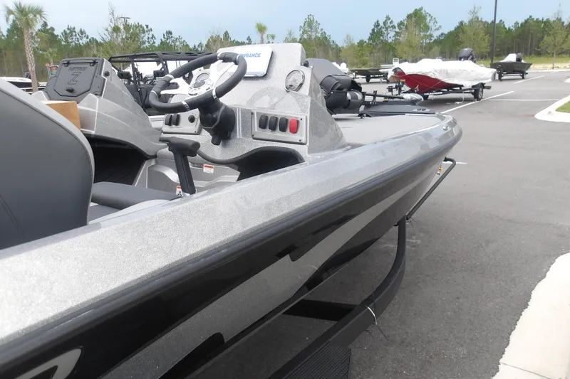 Slide: The Image of 2026 Nitro Z19 XL boat in parking lot, showcasing sleek design and modern features. - 7