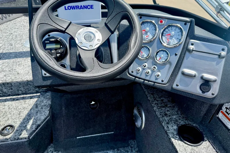 Slide: The Image of Steering console of 2026 Tracker Pro Guide V-175 WT with Lowrance display and gauges. - 12
