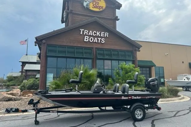 The Image of 2026 Tracker Bass Tracker Classic XL boat displayed outside Tracker Boats store. - 0