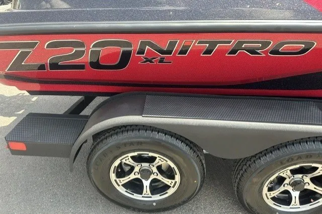 Slide: The Image of 2026 Nitro Z20 XL boat trailer with dual wheels and bold branding. - 4