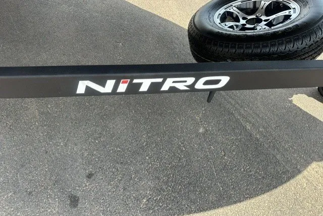 Slide: The Image of 2026 Nitro Z20 XL trailer with logo and spare tire on asphalt surface. - 5