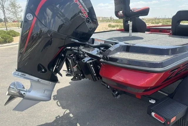 Slide: The Image of 2026 Nitro Z20 XL boat with powerful Mercury Pro XS engine, parked outdoors. - 1