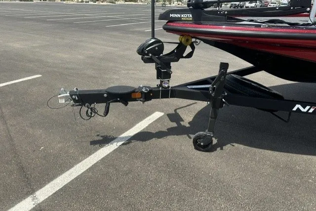 Slide: The Image of Trailer hitch of a 2026 Nitro Z20 XL boat in a parking lot. - 7