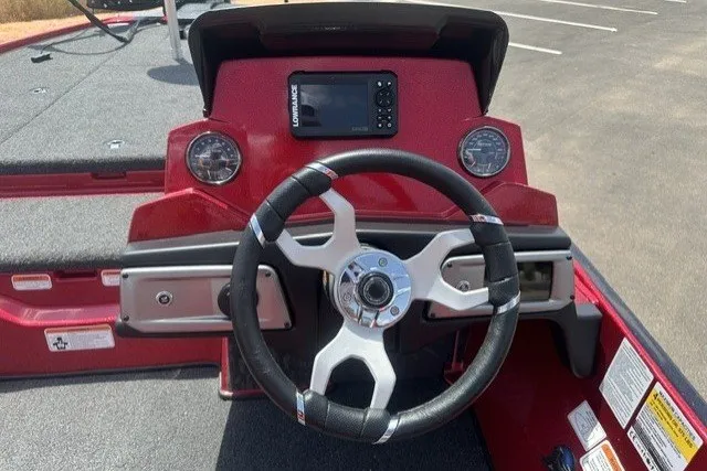 Slide: The Image of Steering console of a 2026 Nitro Z20 XL boat with modern controls and gauges. - 15
