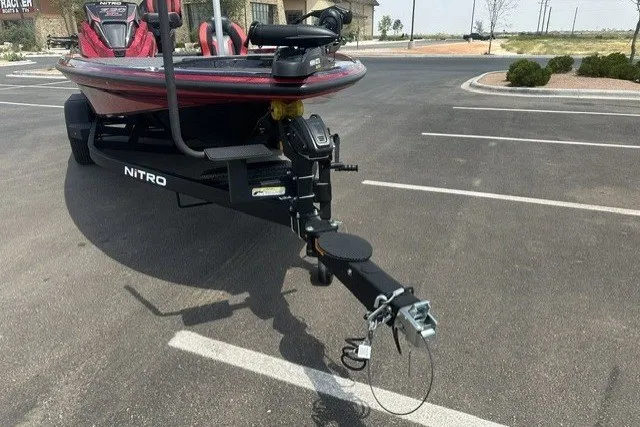 Slide: The Image of 2026 Nitro Z20 XL boat on trailer in parking lot. - 6