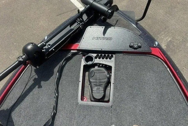 Slide: The Image of The image shows the deck of a Nitro Z20 XL boat with a trolling motor. - 9