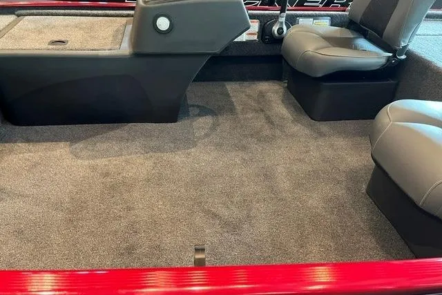 Slide: The Image of Interior of 2026 Tracker Bass Tracker Classic XL boat with gray seating and carpeted floor. - 4