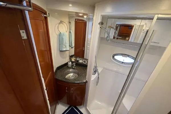 Slide: The Image of Bathroom interior of 2004 Carver 420 Mariner yacht with sink and shower. - 20
