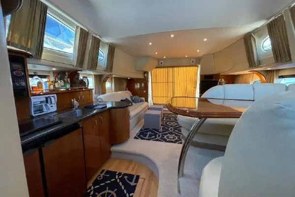 Slide: The Image of Luxurious interior of a 2004 Carver 420 Mariner yacht with modern amenities. - 27