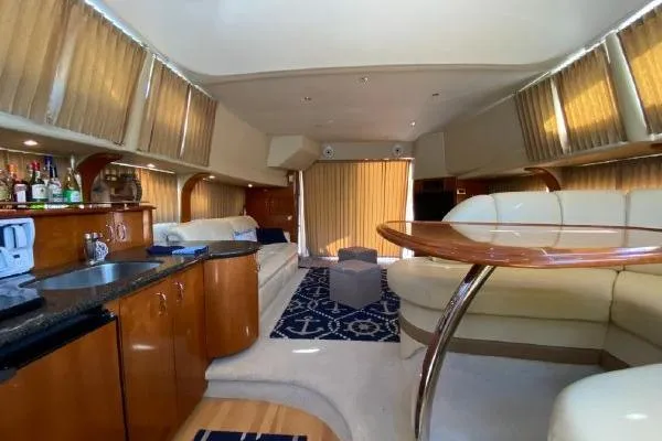 Slide: The Image of Luxurious interior of a 2004 Carver 420 Mariner yacht with elegant furnishings. - 32
