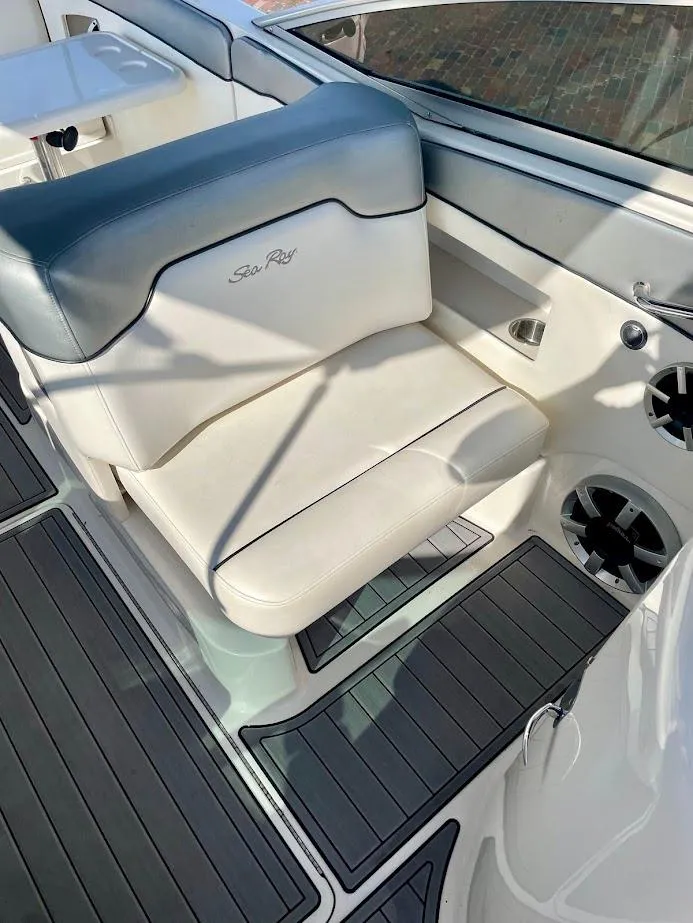 Slide: The Image of 2010 Sea Ray 300 Sundeck boat seat with sleek design and comfortable upholstery. - 15