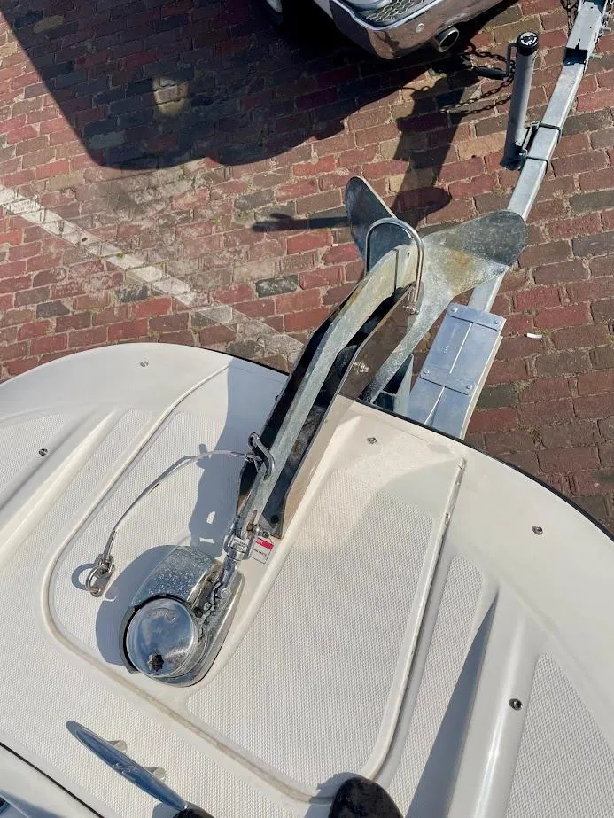 Slide: The Image of 2010 Sea Ray 300 Sundeck boat anchor on a brick surface. - 8