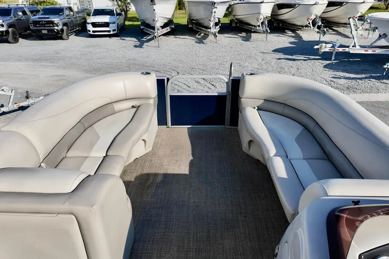 Slide: The Image of 2022 Cypress Cay Seabreeze 232 pontoon boat interior with plush seating. - 10