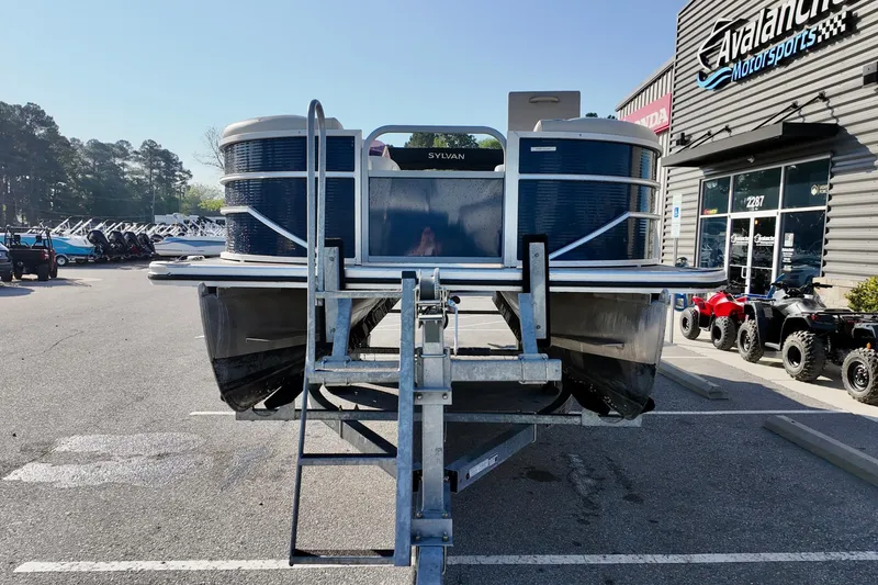 Slide: The Image of 2022 Cypress Cay Seabreeze 232 pontoon boat on trailer at dealership. - 12