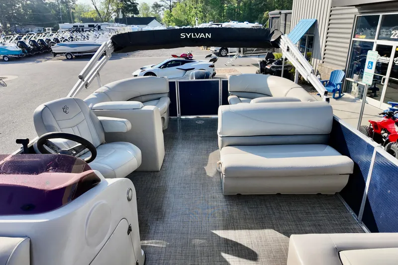 Slide: The Image of 2022 Cypress Cay Seabreeze 232 pontoon boat with spacious seating and modern design. - 8