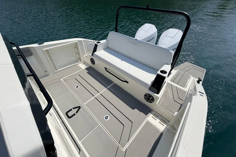 Slide: The Image of 2027 Navan T30 boat deck with seating and twin outboard motors on water. - 5