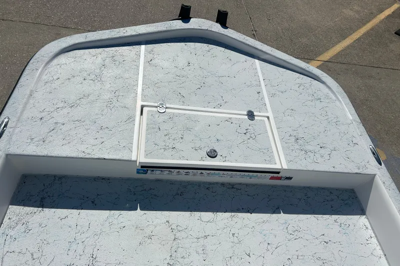 Slide: The Image of 2021 Shallow Stalker CAT-204 Pro boat deck with textured surface and storage hatch. - 9
