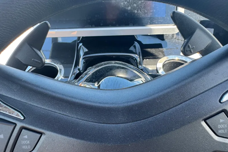 Slide: The Image of Steering wheel and controls of 2026 Yamaha Boats 252SD, showcasing modern design. - 29