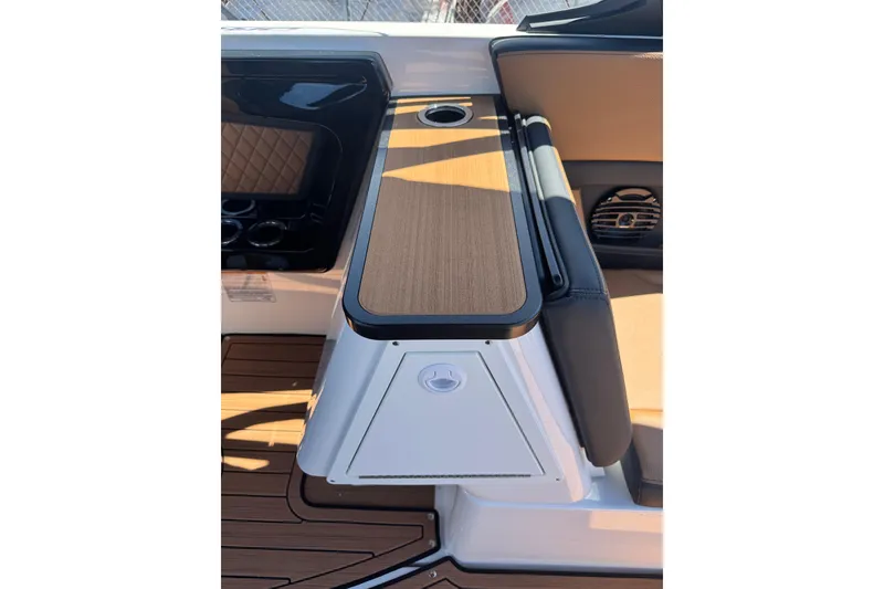Slide: The Image of 2026 Yamaha Boats 252SD interior with sleek seating and modern design. - 22