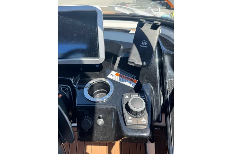 Slide: The Image of 2026 Yamaha Boats 252SD dashboard with control panel and display screen. - 25