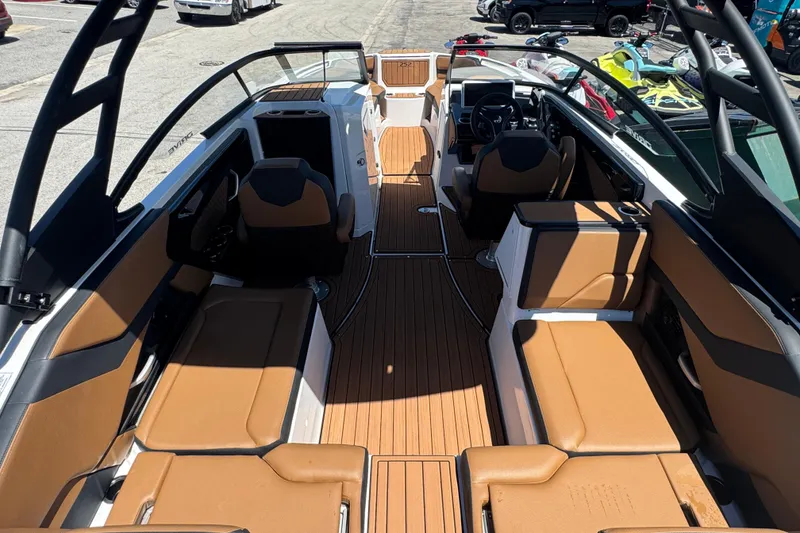 Slide: The Image of 2026 Yamaha Boats 252SD interior with tan seating and sleek design. - 7