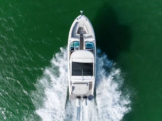 Slide: The Image of Interior of a 2017 Sea Ray SLX 310 with sleek seating. - 4