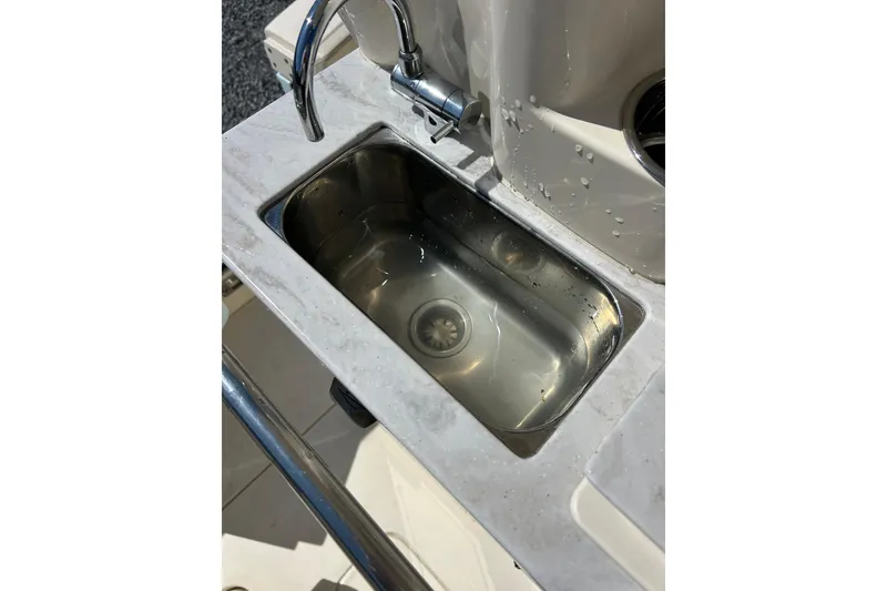 Slide: The Image of Stainless steel sink on 2006 Sea Ray 300 Sundancer boat. - 18