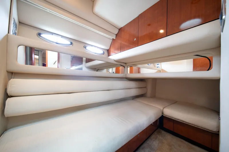 Slide: The Image of Luxurious interior cabin of 2003 Sea Ray 480 Sedan Bridge yacht. - 26