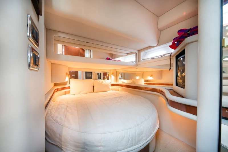 Slide: The Image of Luxurious bedroom interior of 2003 Sea Ray 480 Sedan Bridge yacht. - 30