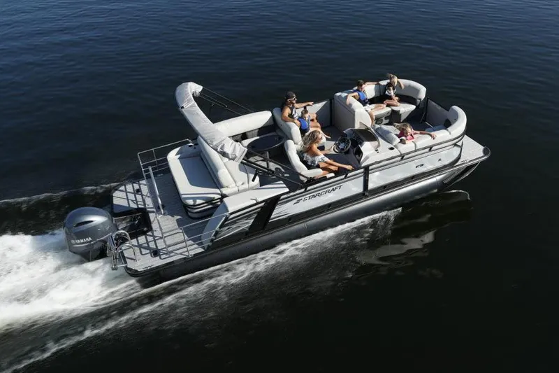Slide: The Image of Manufacturer Provided Image: 2022 Starcraft CX 23 Q pontoon boat cruising on water with passengers. - 3