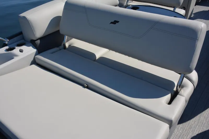 Slide: The Image of Manufacturer Provided Image: 2022 Starcraft CX 23 Q boat with white cushioned seating. - 8