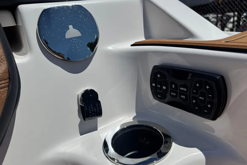 Slide: The Image of Control panel and cup holder on 2026 Yamaha Boats 252SD. - 4