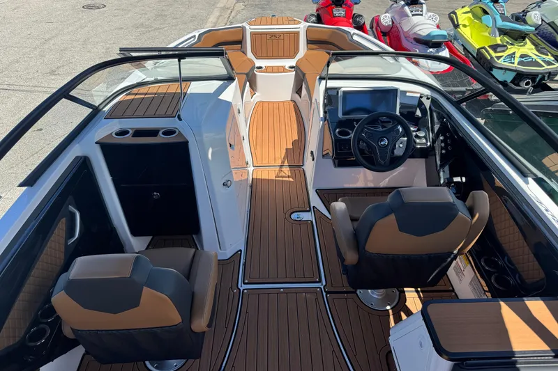 Slide: The Image of 2026 Yamaha Boats 252SD interior with sleek design and modern dashboard. - 8