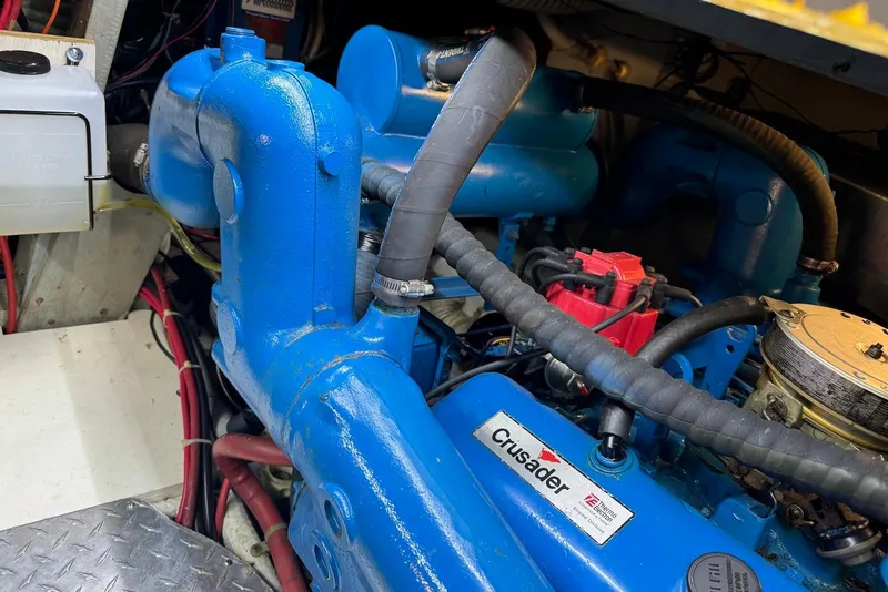 Slide: The Image of Engine room of a 1985 Silverton 40 Aft Cabin with Crusader engine components. - 45