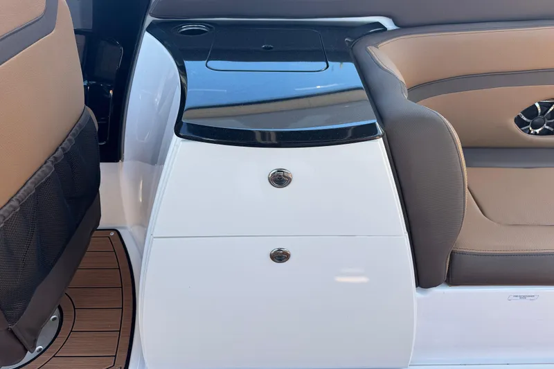 Slide: The Image of Interior of 2025 Yamaha Boats 275SE, featuring sleek seating and storage compartments. - 21