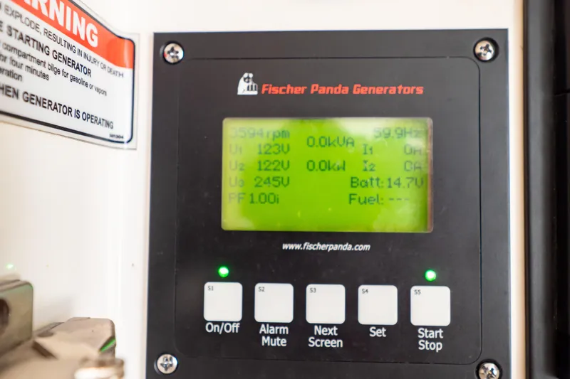 Slide: The Image of Fischer Panda generator display on 2018 Intrepid 475 Sport Yacht, showing voltage and battery status. - 114